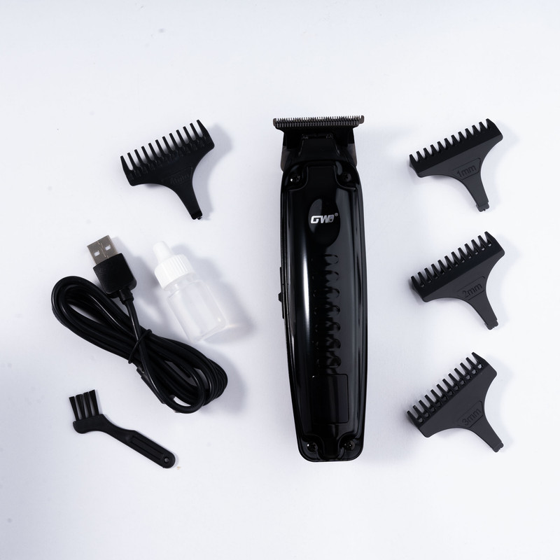 ماشین اصلاح موی سر و صورت جی دبلیو مدل GW-9979، اصلاح به صورت صفر زن، خط زن، منبع انرژی باتری، تکنولوژی اصلاح به صورت تریمر، مدت زمان شارژ 120 دقیقه و مدت زمان استفاده پس از شارژ 120 دقیقه، به همراه کابل شارژ، برس تمیزکننده، روغن، 4 عدد شانه، عملکرد توربو - Image 3