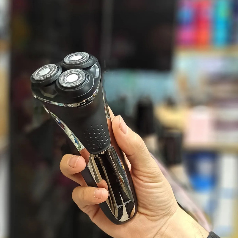 ماشین اصلاح موی صورت پرومارون مدل RL-710، اصلاح به صورت خط زن، حجم زن و صفر زن، استفاده به صورت خشک و مرطوب، طراحی ارگونومیک، منبع انرژی باتری قابل شارژ، تکنولوژی اصلاح به صورت برش چرخشی، مدت زمان شارژ 90 دقیقه و مدت زمان استفاده پس از شارژ 45 دقیقه - Image 9