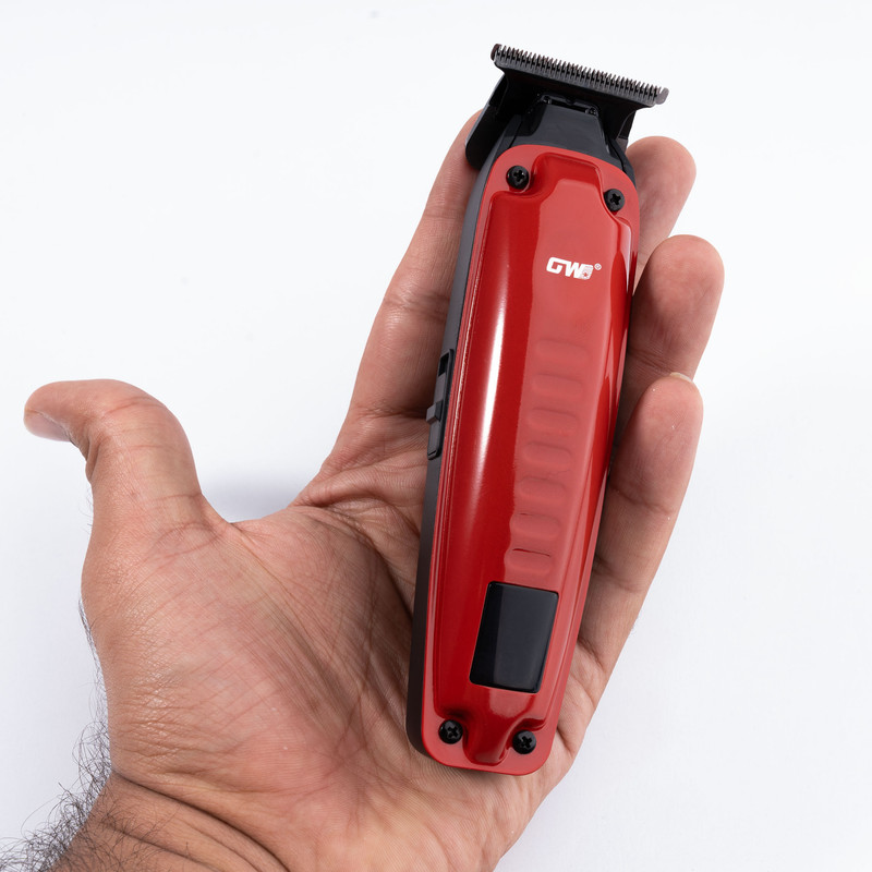 ماشین اصلاح موی سر و صورت جی دبلیو مدل GW-9979، اصلاح به صورت صفر زن، خط زن، منبع انرژی باتری، تکنولوژی اصلاح به صورت تریمر، مدت زمان شارژ 120 دقیقه و مدت زمان استفاده پس از شارژ 120 دقیقه، به همراه کابل شارژ، برس تمیزکننده، روغن، 4 عدد شانه، عملکرد توربو - Image 15