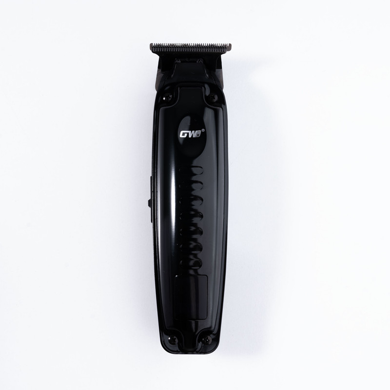 ماشین اصلاح موی سر و صورت جی دبلیو مدل GW-9979، اصلاح به صورت صفر زن، خط زن، منبع انرژی باتری، تکنولوژی اصلاح به صورت تریمر، مدت زمان شارژ 120 دقیقه و مدت زمان استفاده پس از شارژ 120 دقیقه، به همراه کابل شارژ، برس تمیزکننده، روغن، 4 عدد شانه، عملکرد توربو - Image 4