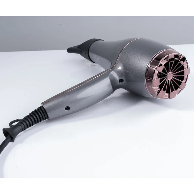 سشوار حرفهای رومئو مدل RM-5858، موتور AC با توان مصرفی 2200 وات، دارای قابلیت باد سرد، طراحی ارگونومیک، دارای حلقه آویختن، با حالت صافکننده و حجمدهنده، وزن 450 گرم، تنظیم حرارت 3 حالته و کنترل سرعت 2 حالته، به همراه متمرکزکننده باریک - Image 6