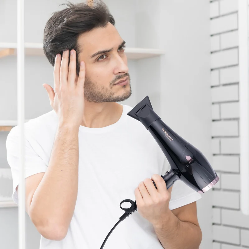 سشوار حرفهای بیبی باس نانو مدل 9000 BA، موتور AC با توان مصرفی 9000 وات، دارای قابلیت تعویض سری، باد سرد و فناوری تولید یون، با حالت صافکننده و حجمدهنده، تنظیم حرارت 3 حالته و کنترل سرعت 2 حالته، به همراه 2 سری متمرکزکننده - Image 3