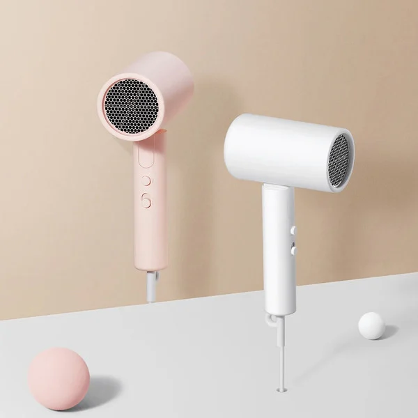 سشوار مسافرتی خانگی شیائومی مدل CMJ04LXEU، موتور AC با توان مصرفی 1600 وات، دارای قابلیت باد سرد، فناوری تولید یون و نرم کنندهی یونی، با حالت صافکننده و حجمدهنده، تنظیم حرارت 2 حالته و کنترل سرعت 2 حالته، به همراه متمرکزکننده - Image 14