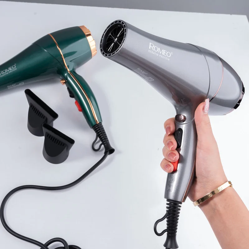 سشوار حرفهای رومئو مدل RM-5858، موتور AC با توان مصرفی 2200 وات، دارای قابلیت باد سرد، طراحی ارگونومیک، دارای حلقه آویختن، با حالت صافکننده و حجمدهنده، وزن 450 گرم، تنظیم حرارت 3 حالته و کنترل سرعت 2 حالته، به همراه متمرکزکننده باریک - Image 14